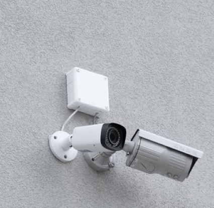 Close up of CCTV cameras on the wall of a building